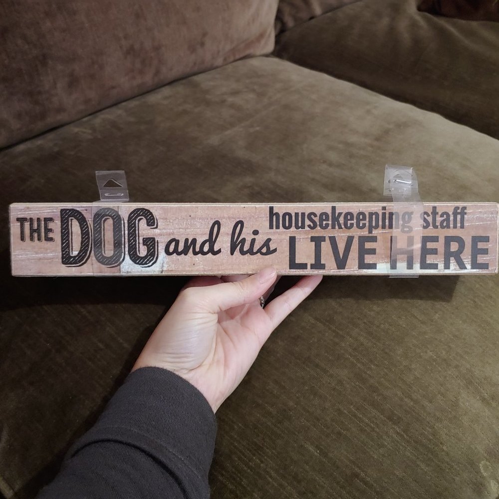 The Dog and his housekeeping staff Live Here - sign